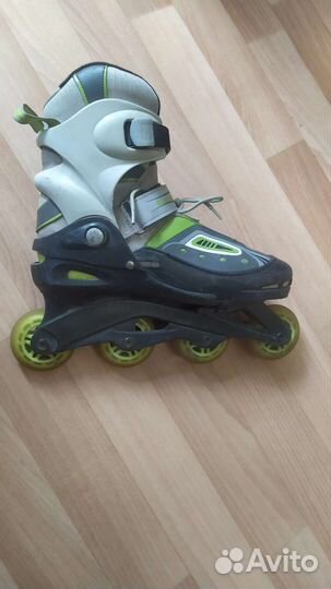 Роликовые коньки