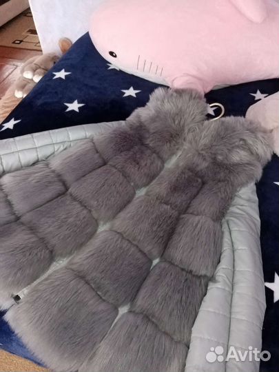 Меховая жилетка