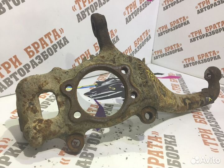 Ниссан Навара Кулак передней ступицы Лев