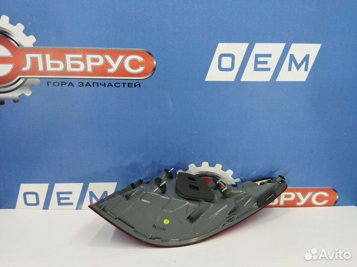 Фонарь левый внешний Kia Quoris новое