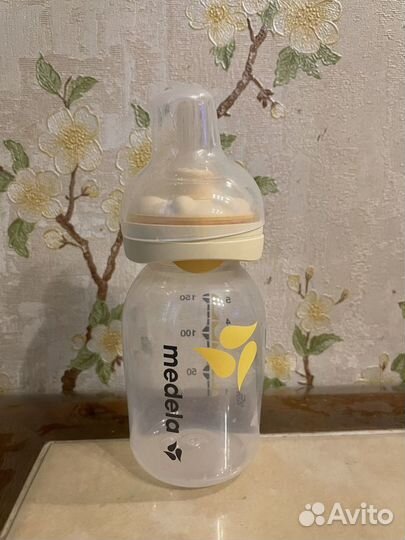 Молокоотсос электрический + бутылочка medela