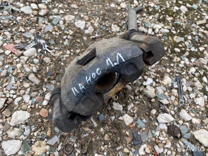 Тормозной суппорт передний левый Chevrolet Lanos