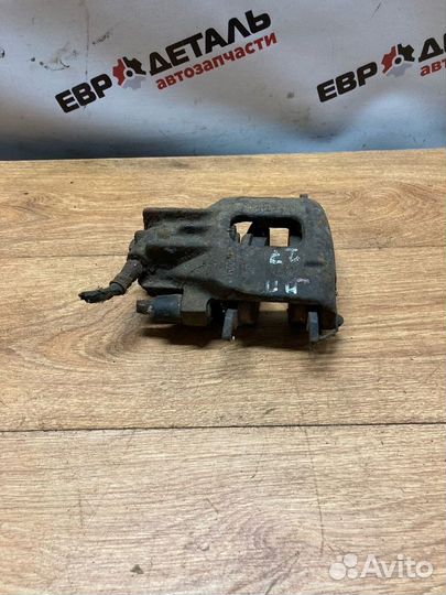 Суппорт тормозной передний правый Focus 1