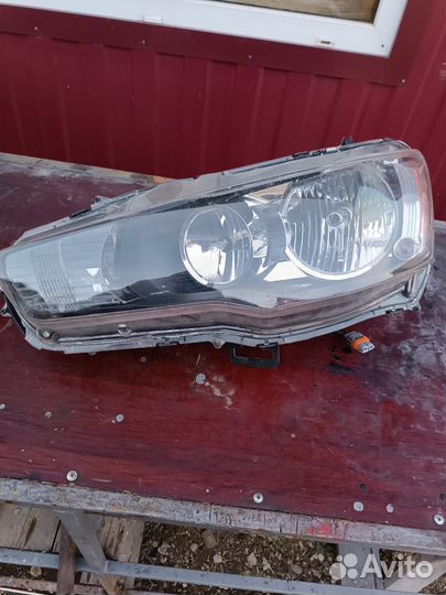 Фара передняя левая Mitsubishi lancer 10