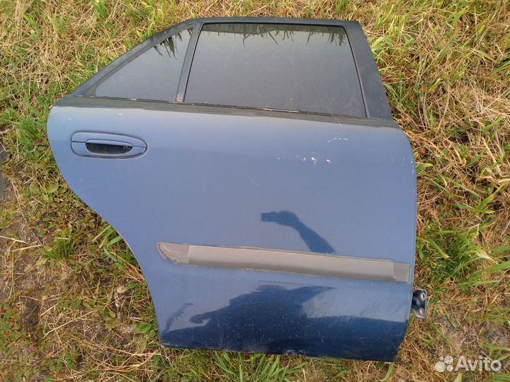 Двери mazda 626