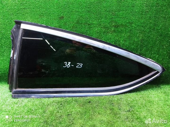 Стекло кузовное глухое левое Opel Astra J (2010-2