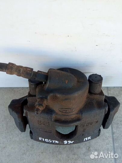 Суппорт тормозной передний правый Ford Fiesta 4