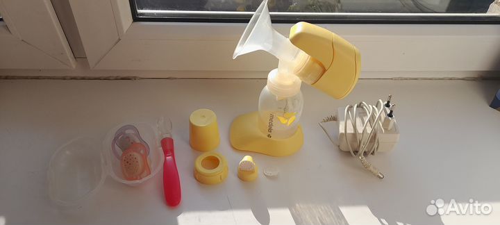 Электрический молокоотсос Medela