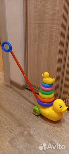 Развивающие игрушки каталка утка