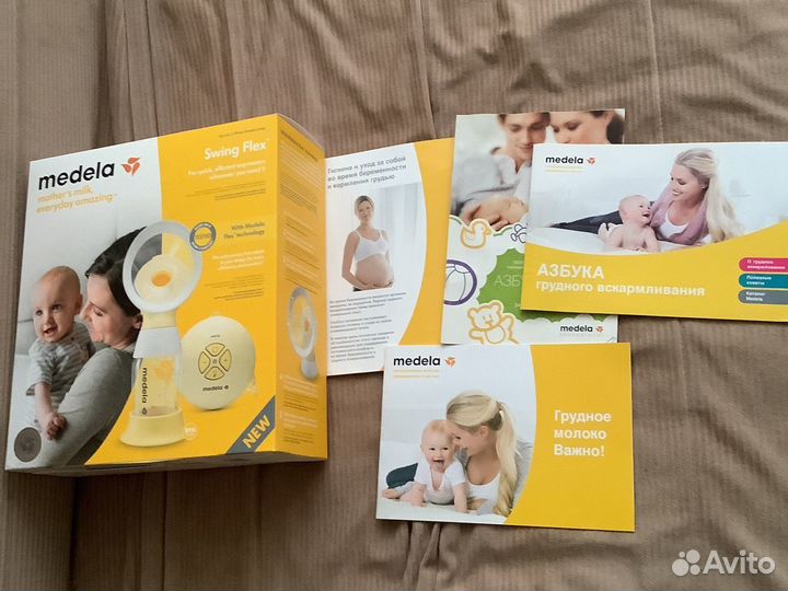 Молокоотсос medela swing flex
