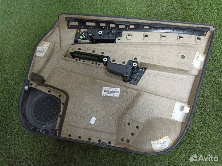 Обшивка двери передняя левая Opel Zafira B