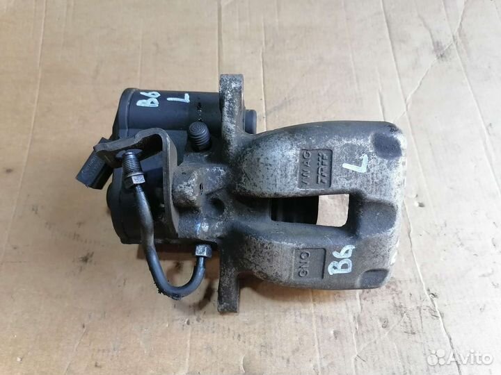 Суппорт задний левый VW Passat B6