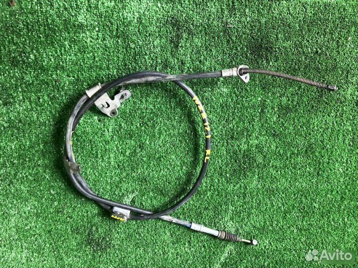 Тросик ручника задний левый Toyota Corolla NZE121