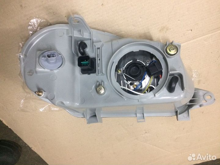 Фара левая Chevrolet Lanos механический корректор