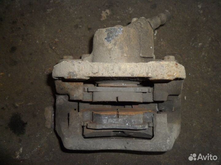 Суппорт передний правый Renault Logan LS0G K7J710