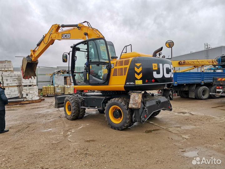 Стекло лобовое верхнее экскаватор Jcb JC 180