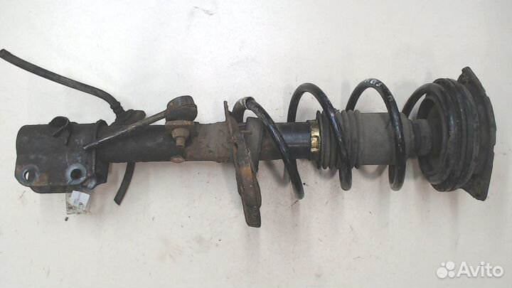 Амортизатор подвески Nissan Micra K12E, 2005