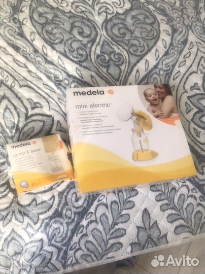 Молокоотсос medela электрический