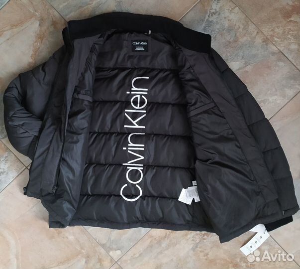 Пуховик оригинальный новый