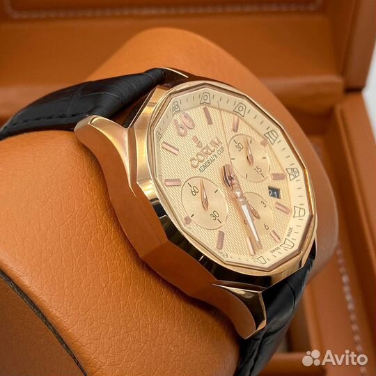 Часы Corum