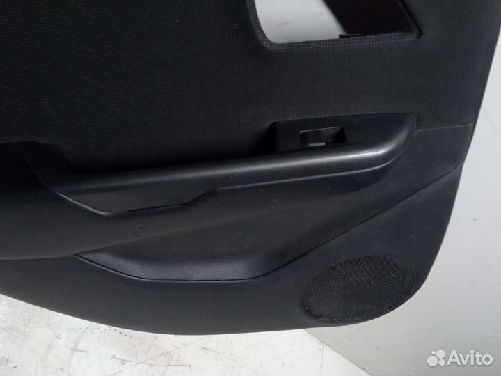 Обшивка двери задней левой Kia Rio 3