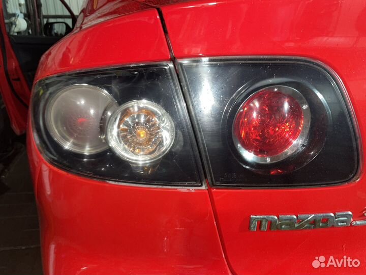 Задний левый фонарь+в багажник mazda 3 bk седан