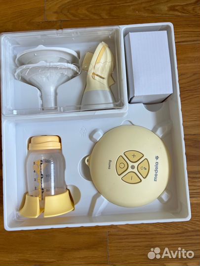 Молокоотсос Medela Swing Flex + мешки