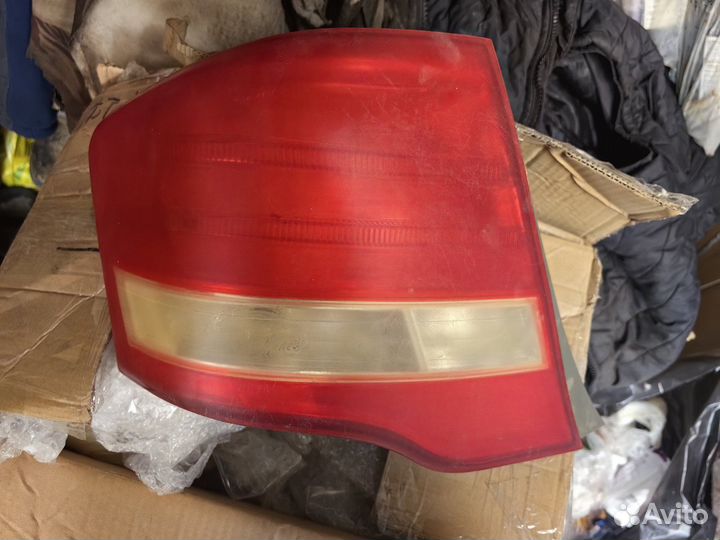 Фара Тойота аксио левая задняя