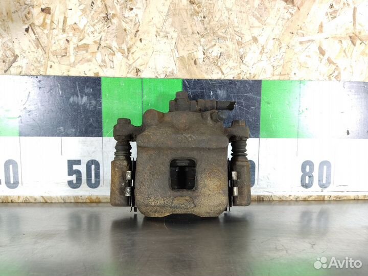 Суппорт передний левый Mazda Carol 2004-2009