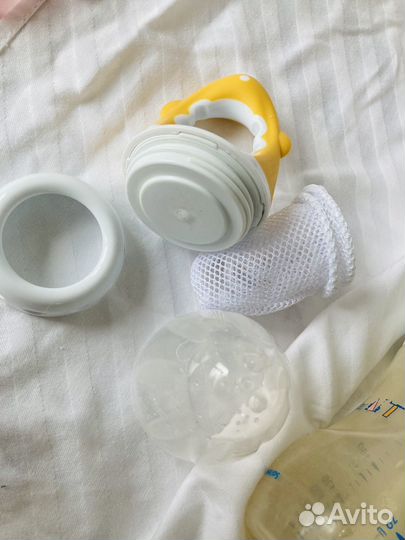 Молокоотсос и бутылочки