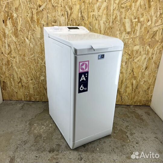 Стиральная машина с вертикальной загрузкой 6