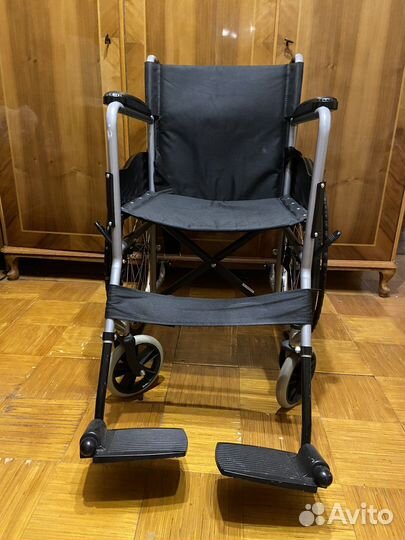 Инвалидная коляска