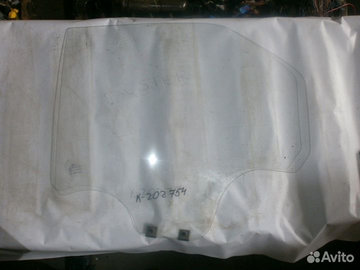 Стекло двери заднее левое (Renault Logan)
