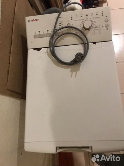 Стиральная машина с вертикальной загрузкой