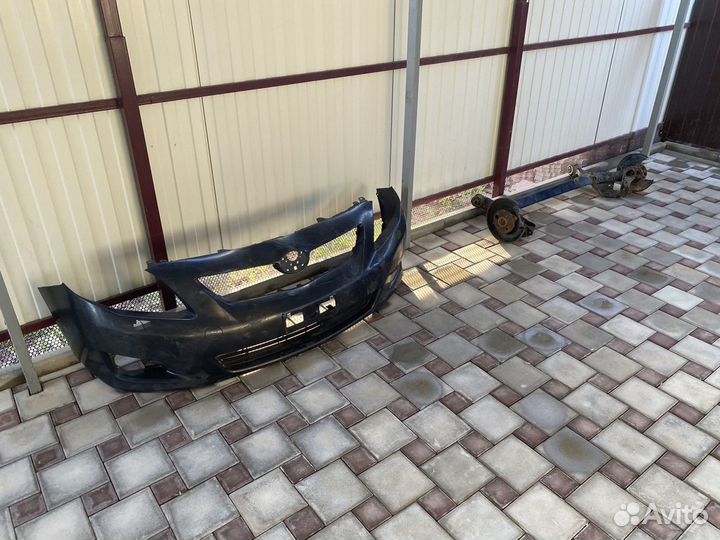 Бампер Toyota Corolla e150