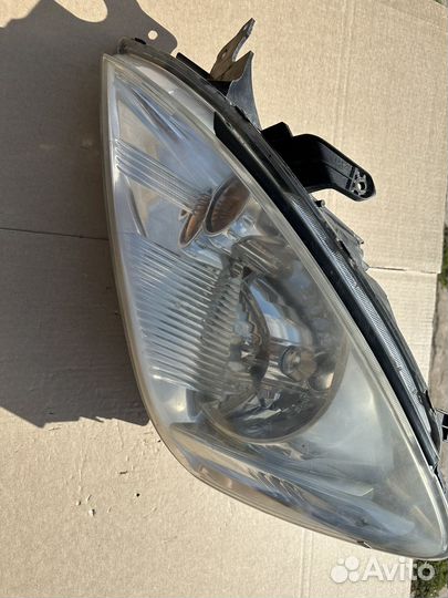 Фара левая Mitsubishi Lancer 9