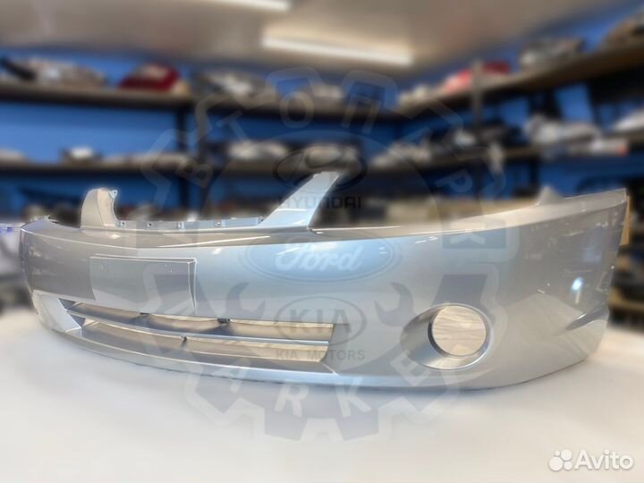 Бампер передний KIA Spectra серебристый