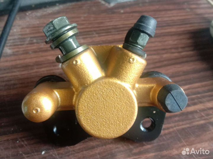 Суппорт тормозной левый