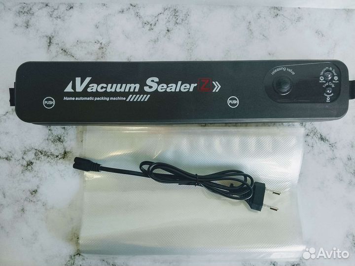 Вакуумный упаковщик вакууматор