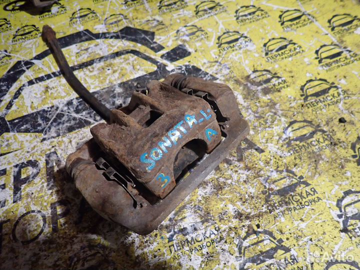 Суппорт тормозной задний левый Hyundai Sonata 4