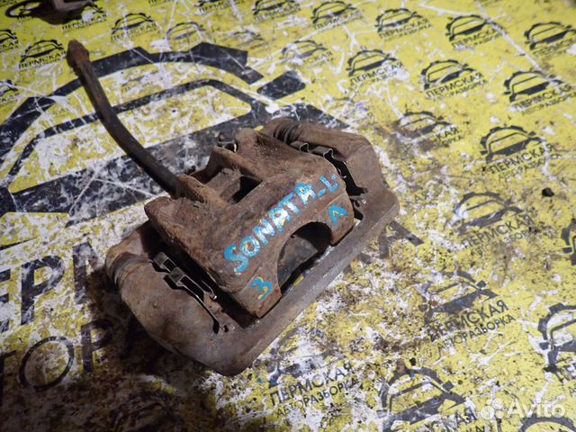 Суппорт тормозной задний левый Hyundai Sonata 4