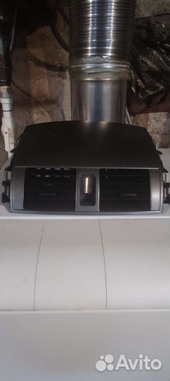 Дефлектор центральный Toyota Corolla E150