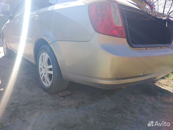 Задний бампер Шевроле lacetti седан