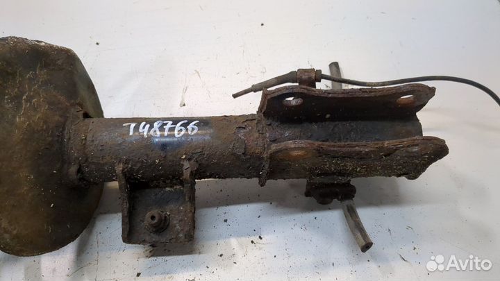 Амортизатор подвески левый передний Suzuki Grand Vitara