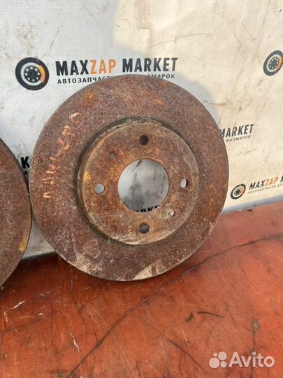 Тормозной диск передний Mitsubishi Lancer 9