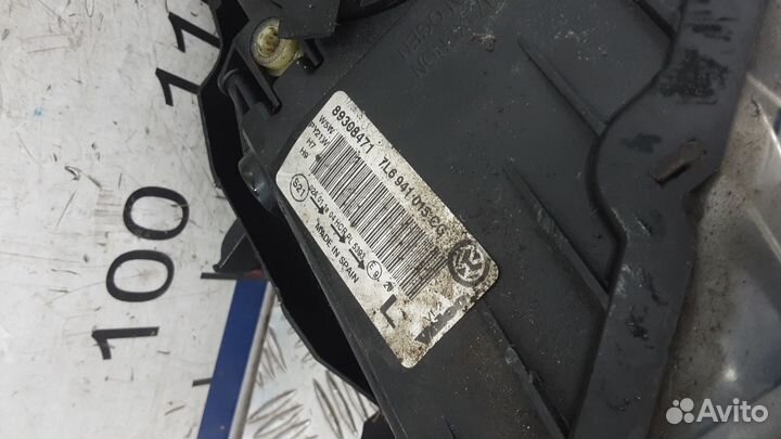 Фара левая Volkswagen Touareg 2005