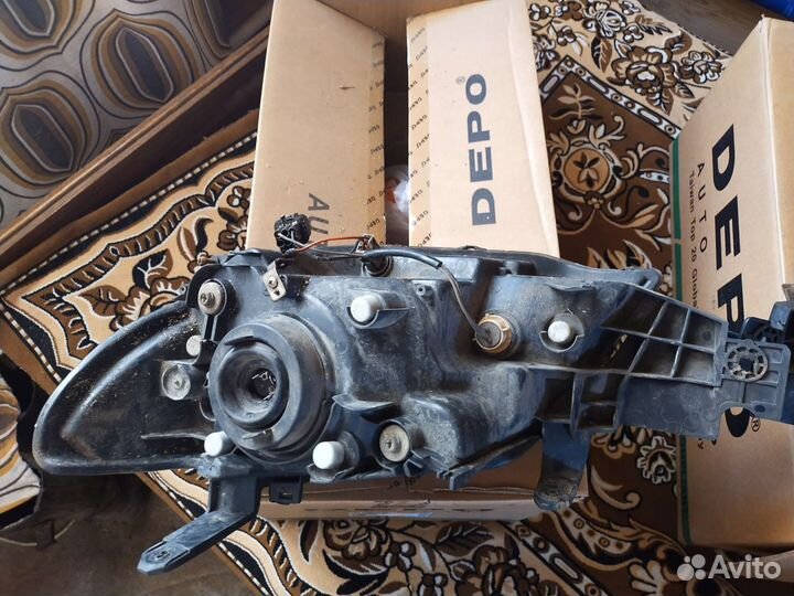 Фары Митсубиси аутлендер 1