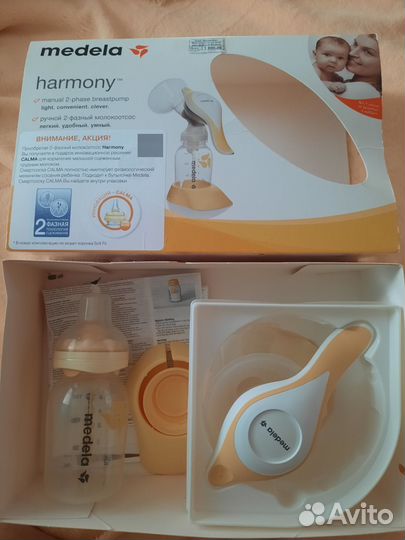 Молокоотсос medela