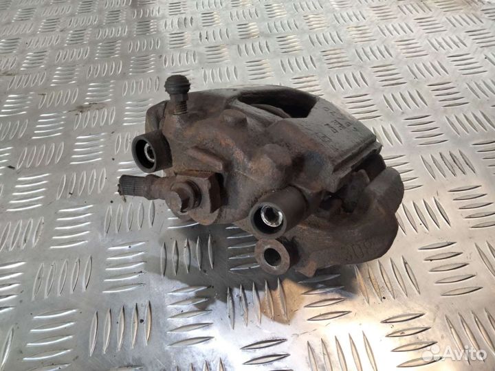 Суппорт передний левый Опель Вектра А