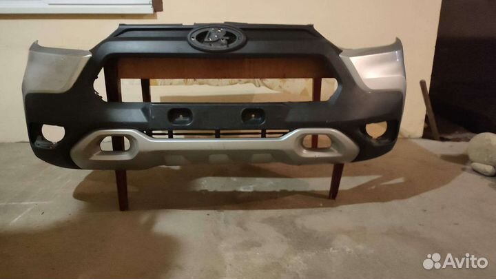 Передний бампер на ниву тревал